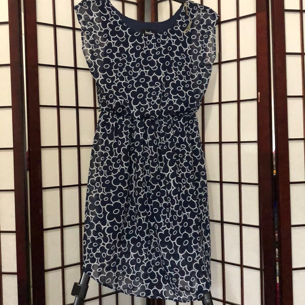 Asymmetric dress with floral prints